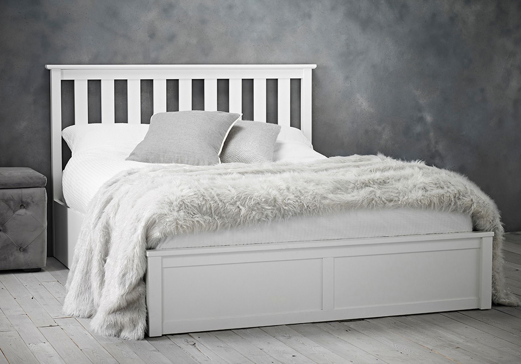 white wooden ottoman bed with mattress