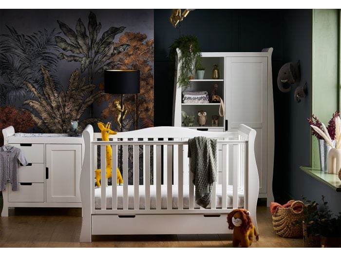 Luxury white 3 piece sleigh design nursery set. Includes cot bed with drawer, double wardrobe and changing unit with storage.