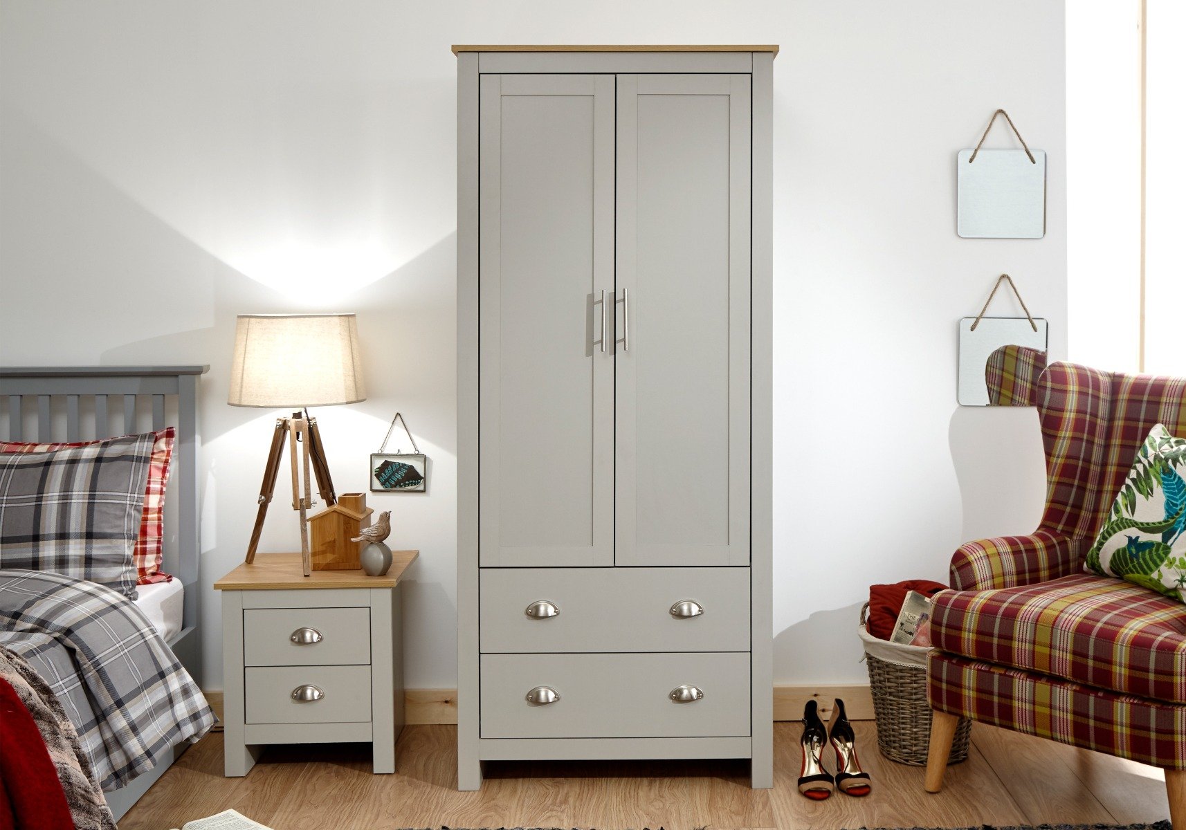 Grey wardrobe next to matching bedside table