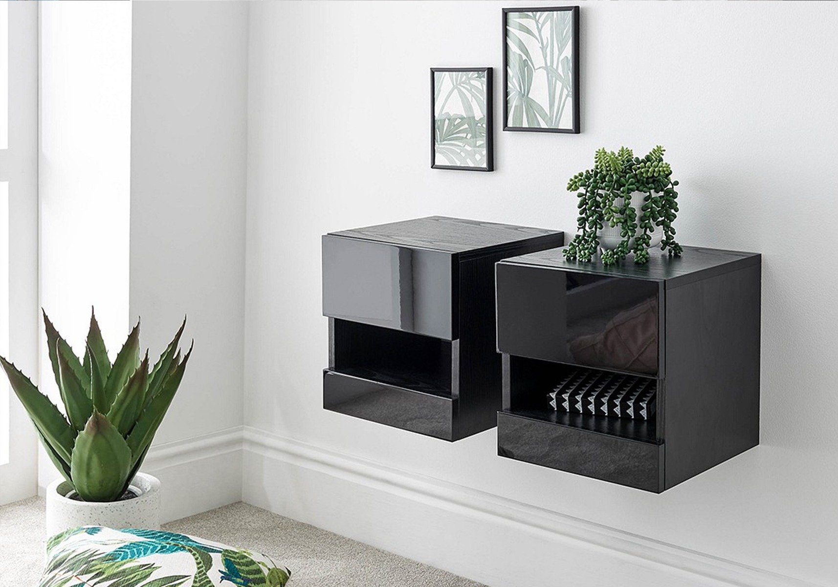 pair of black hanging bedside tables